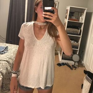 Grey and white shirt with neck strap